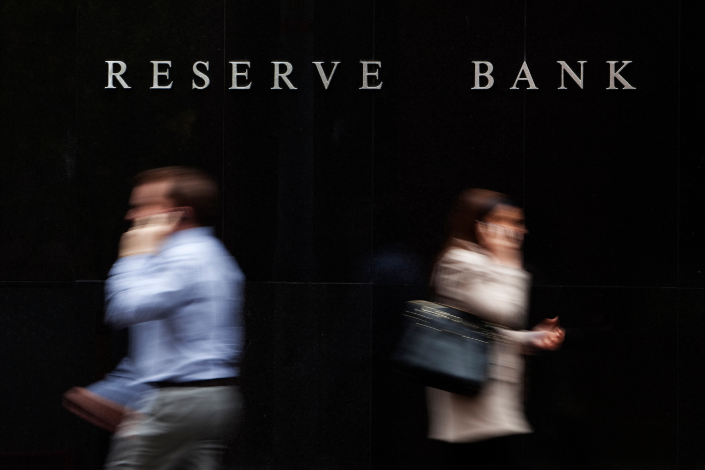 People walking by the National Reserve Bank