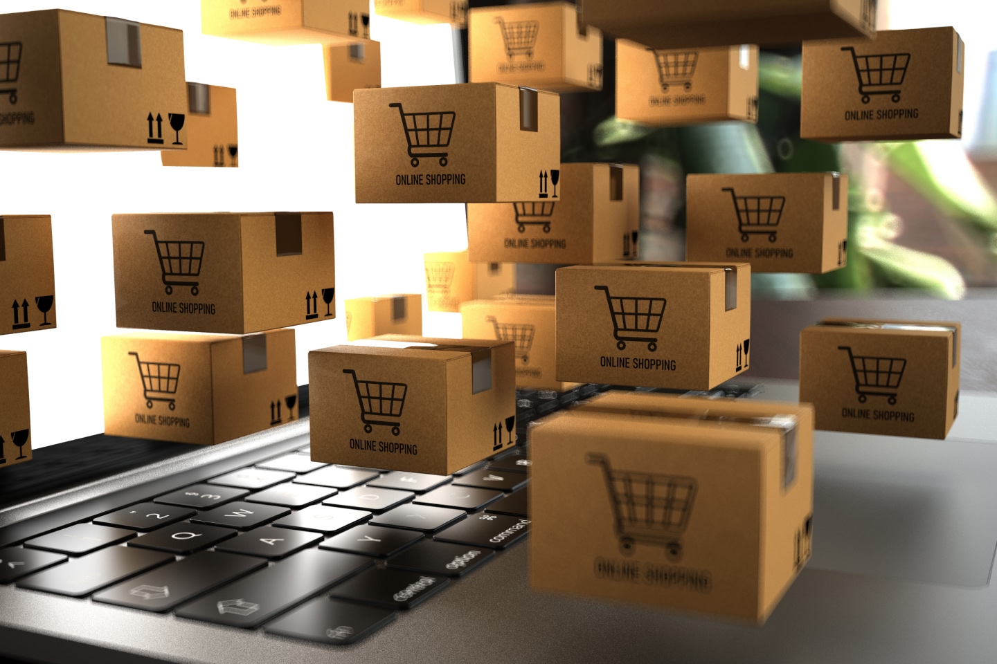 Floating shipping boxes over a laptop indicating online shopping from services like Amazon