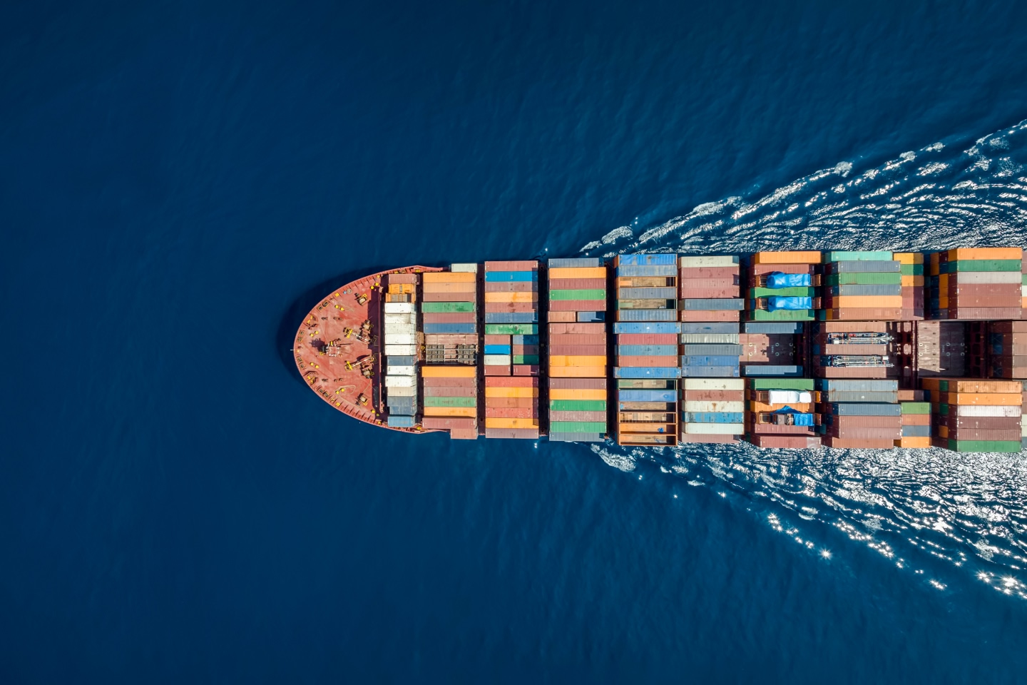 Cargo ship from above representing Qube logistics