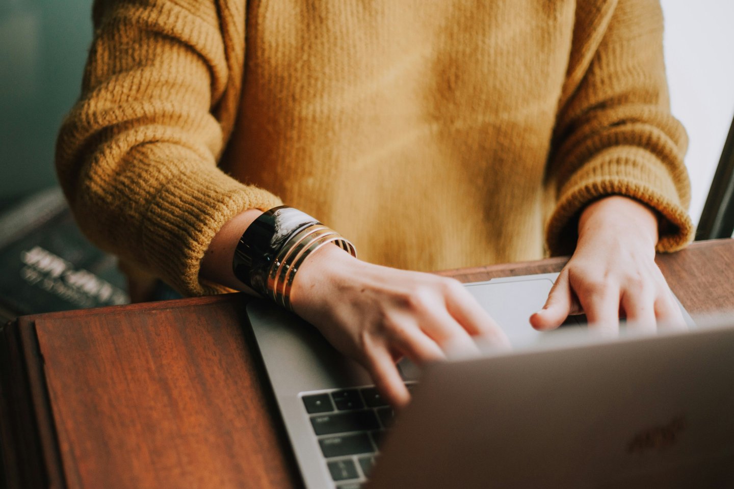 Woman on her laptop checking her super balance