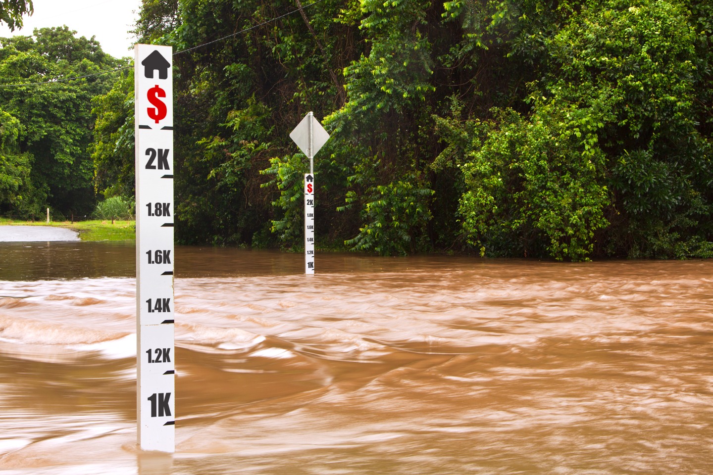 Flood marker showing how rising flood levels have seen record highs linked to climate change