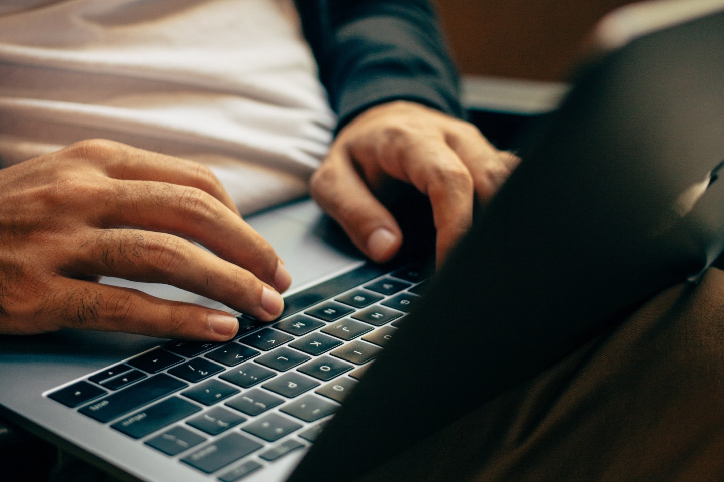 Person using a laptop to file a tax return