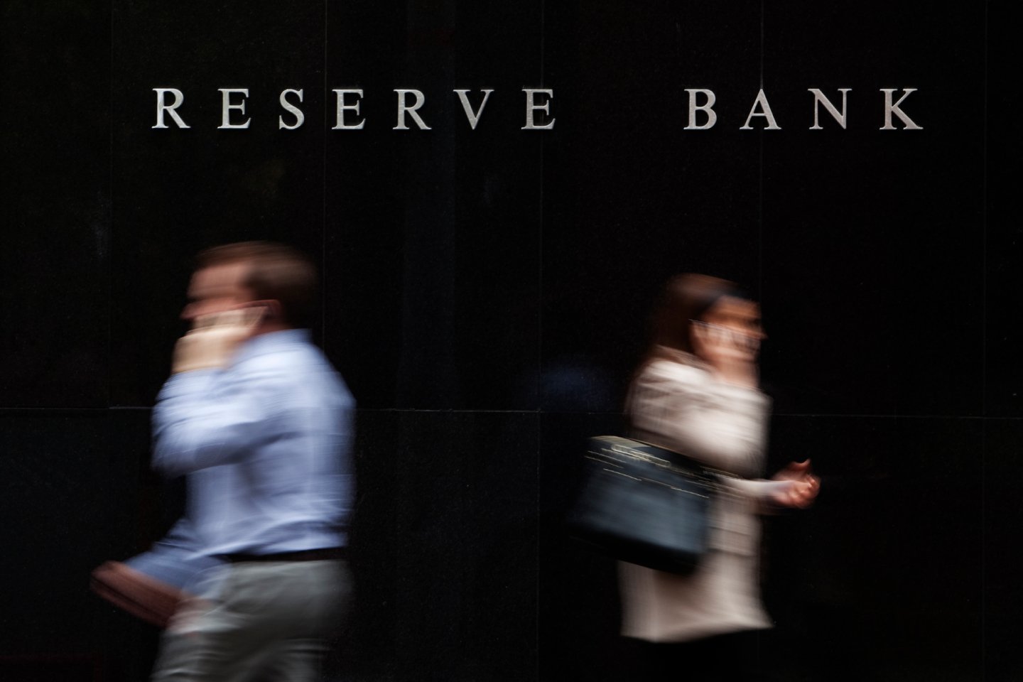 People walking by the National Reserve Bank