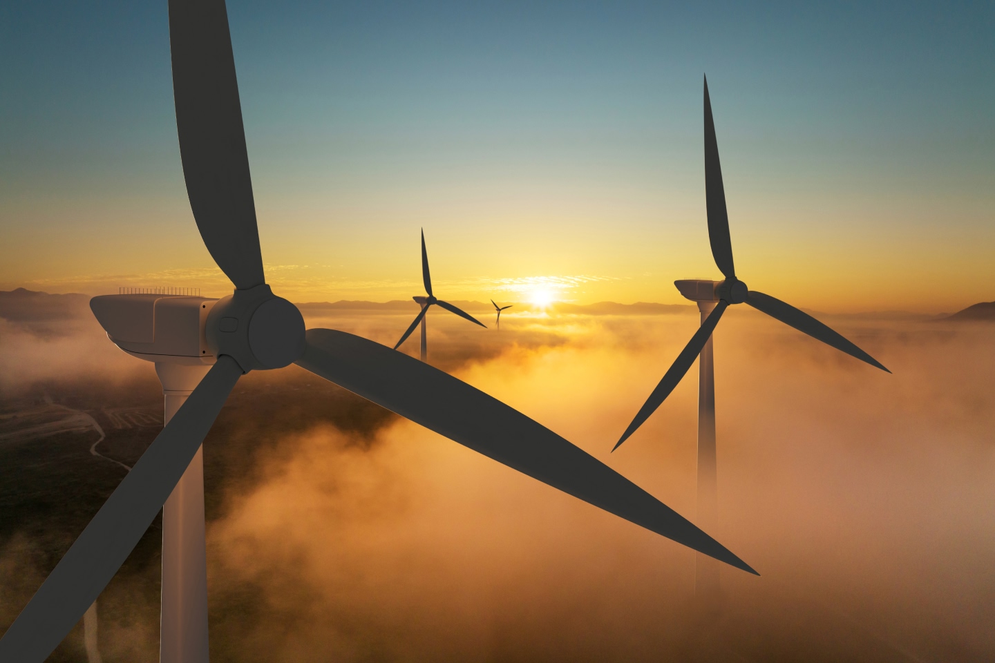A wind farm in the clouds signalling investment in renewable energy like wind power