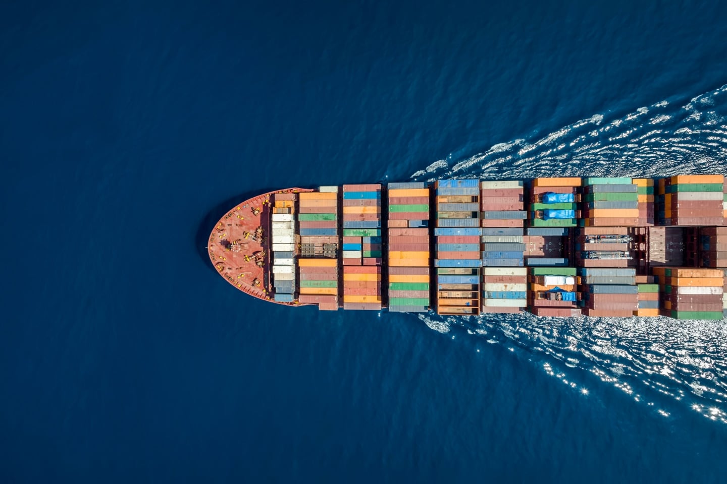 Cargo ship from above representing Qube logistics