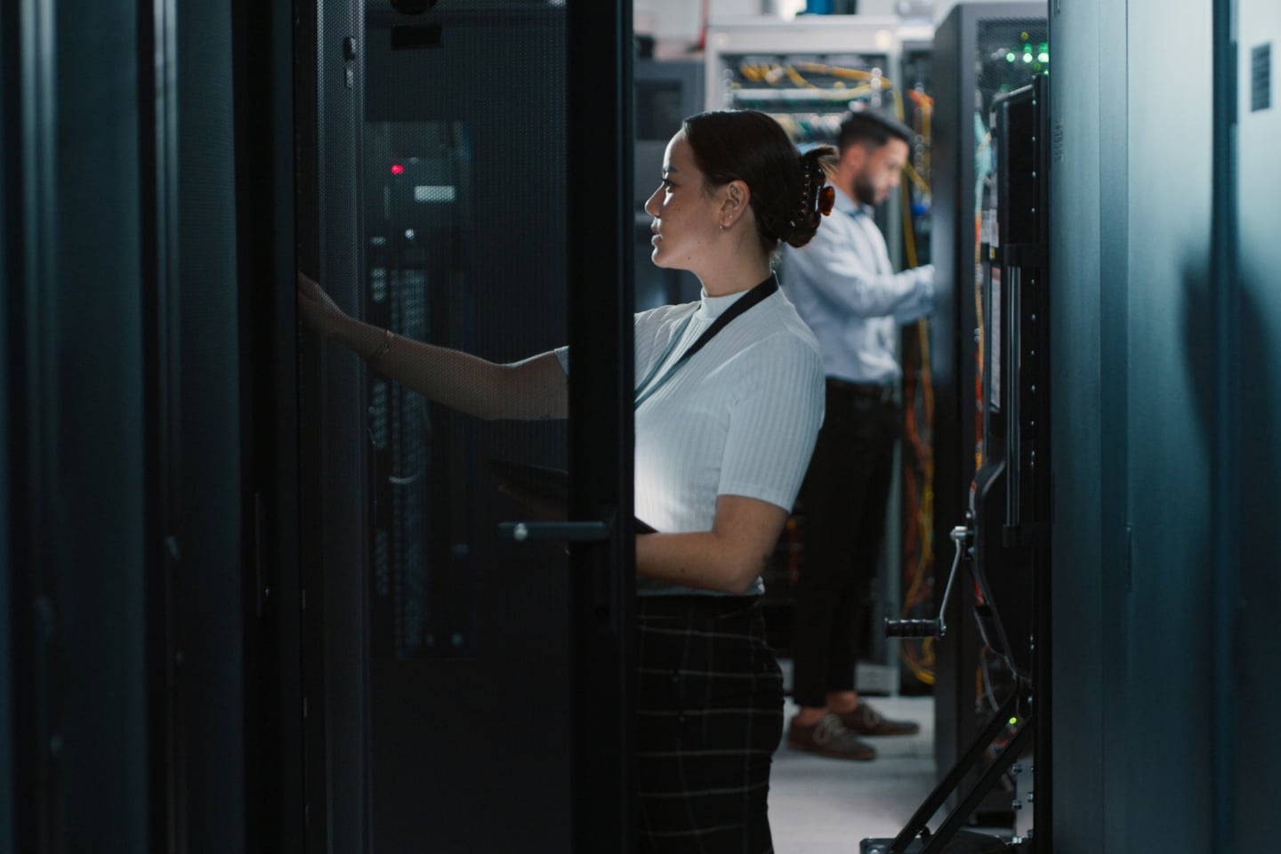 People working in a data centre representing investment in AI