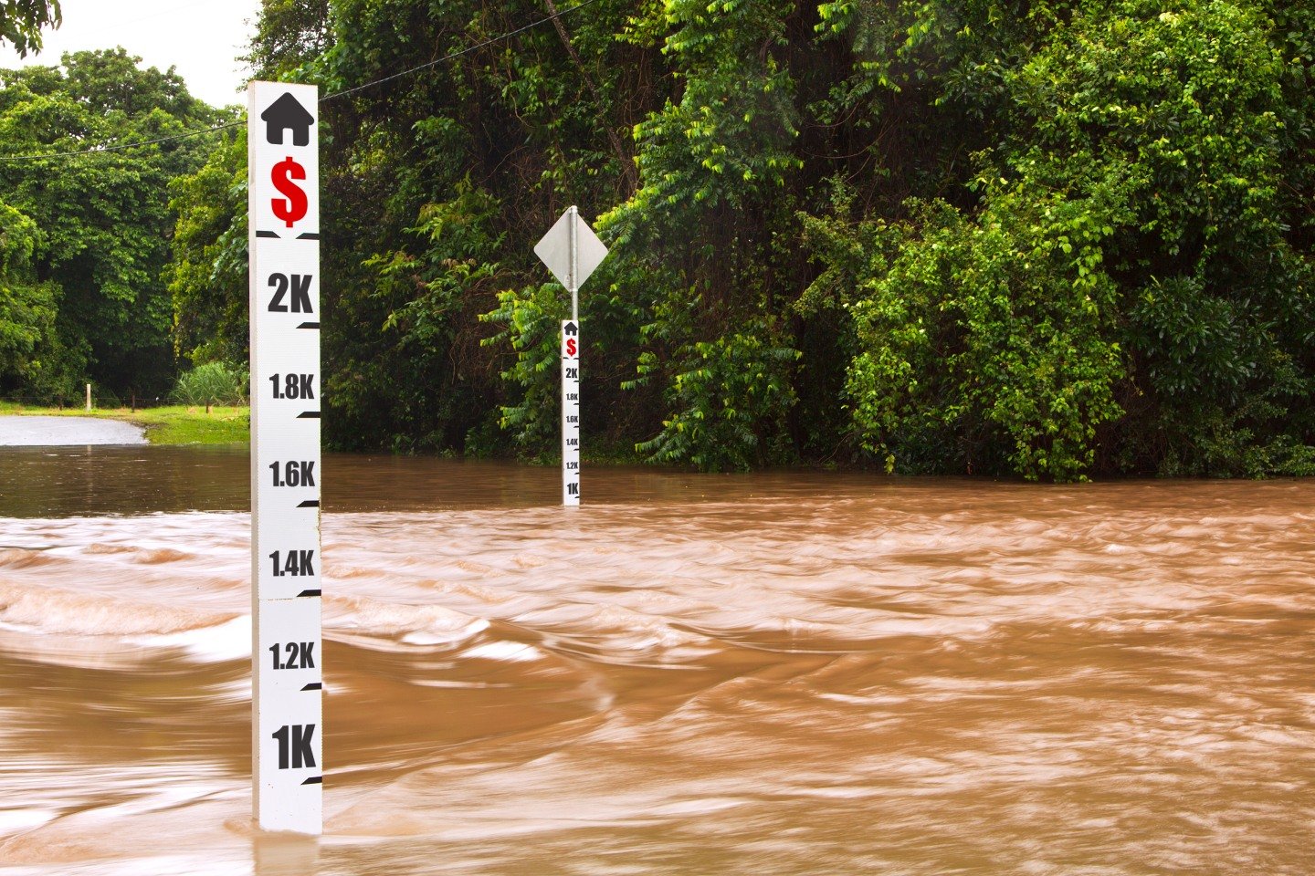 Flood marker showing how rising flood levels have seen record highs linked to climate change