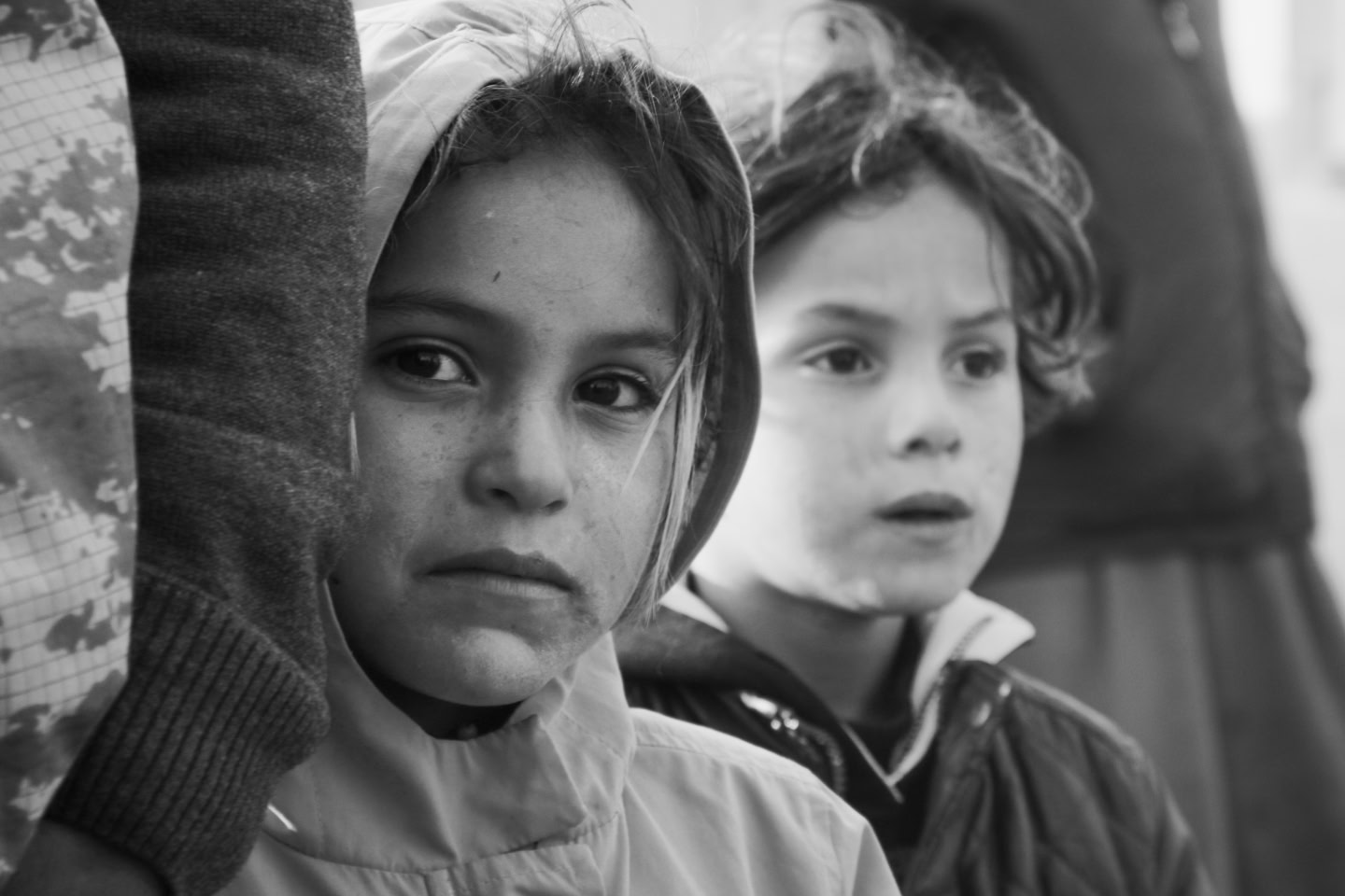 Black and white image of children in a line